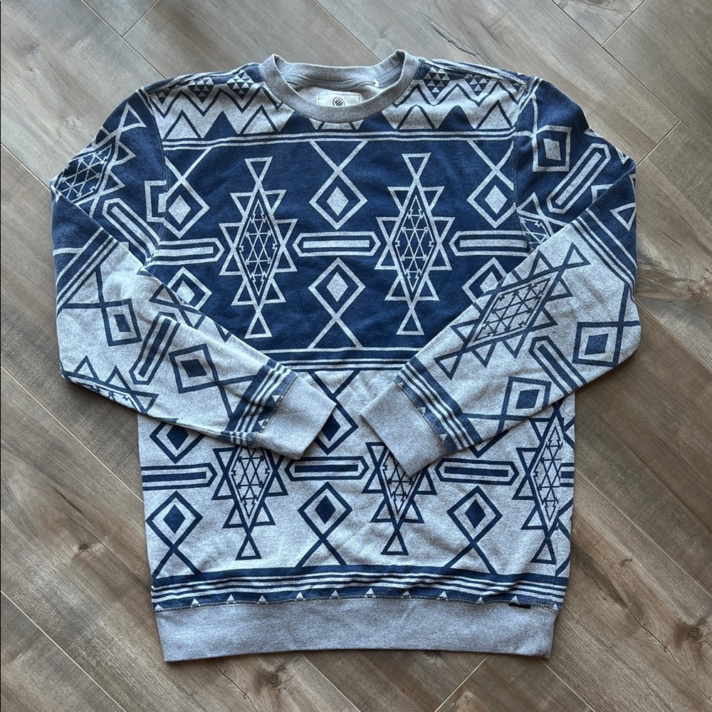 On the Byas Navy and Light Gray Geometric Crewneck Sweater